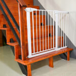 dog gate safety door, white fence for safety on stairs; pet-proofing your home