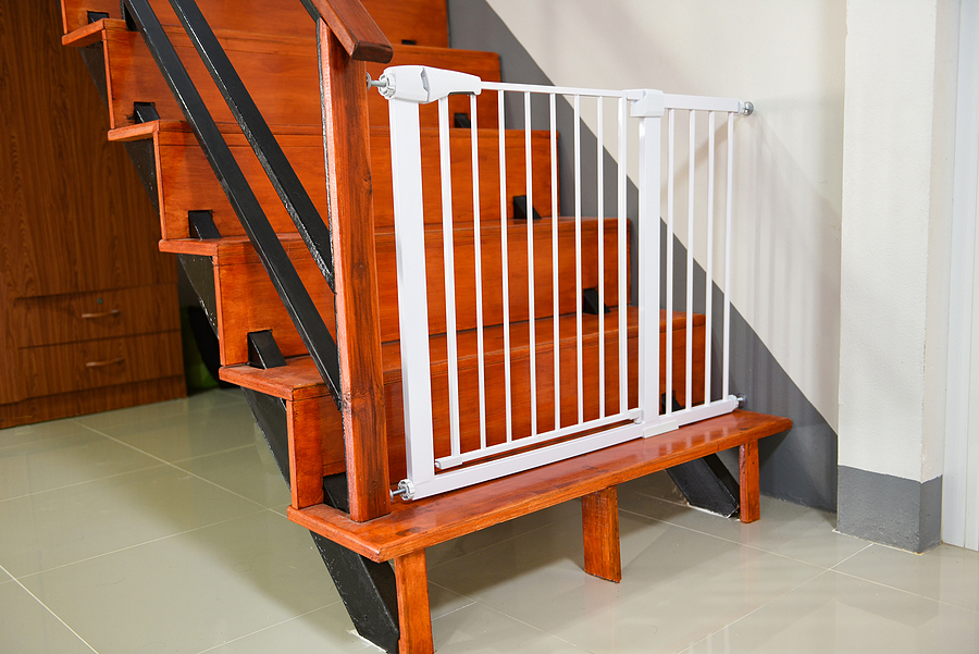 dog gate safety door, white fence for safety on stairs; pet-proofing your home